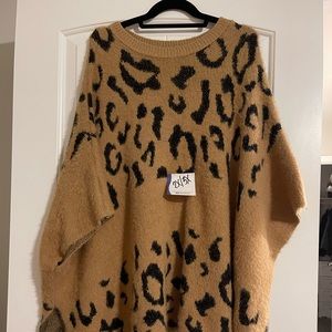Super soft and pet worthy leopard poncho